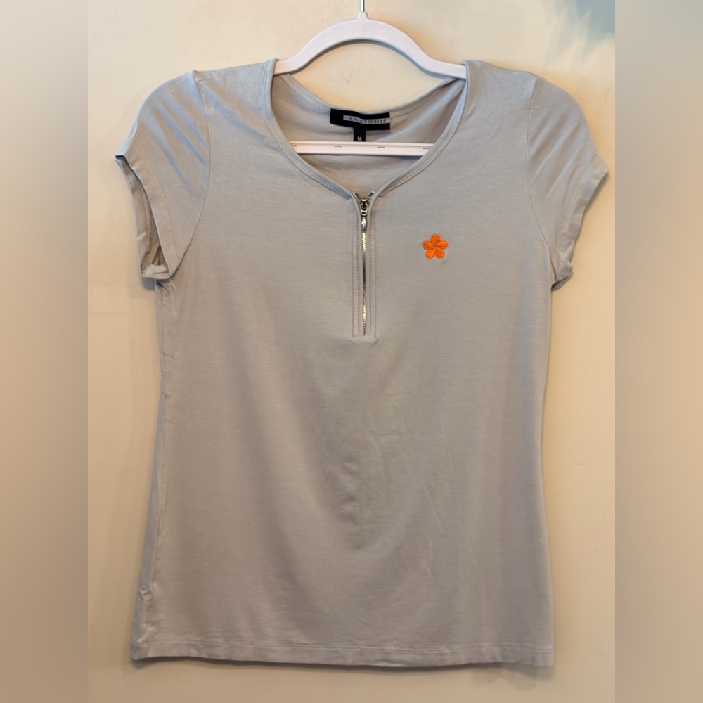 ANATOMIE Zip-Front Short Sleeve Top with Orange Flower Accent